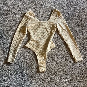 Elegant Cream Textured Bodysuit